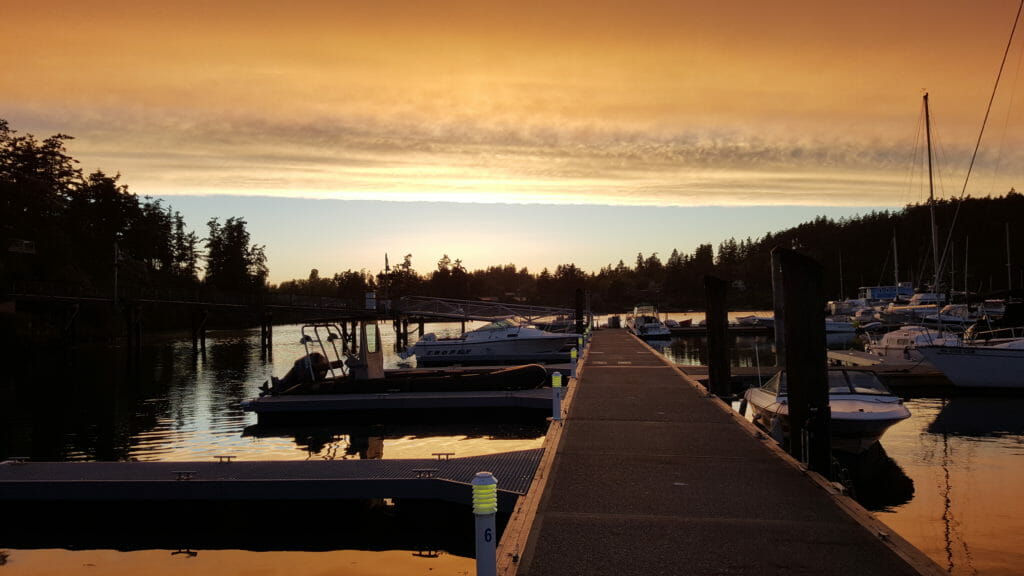 Walking the docks as a cold front moves through at sunset.