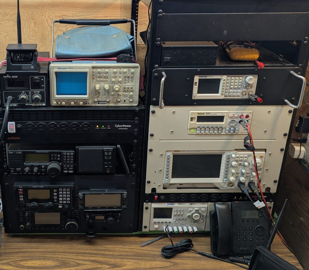 two electronics racks in mobile lab - ham radio and test equipment
